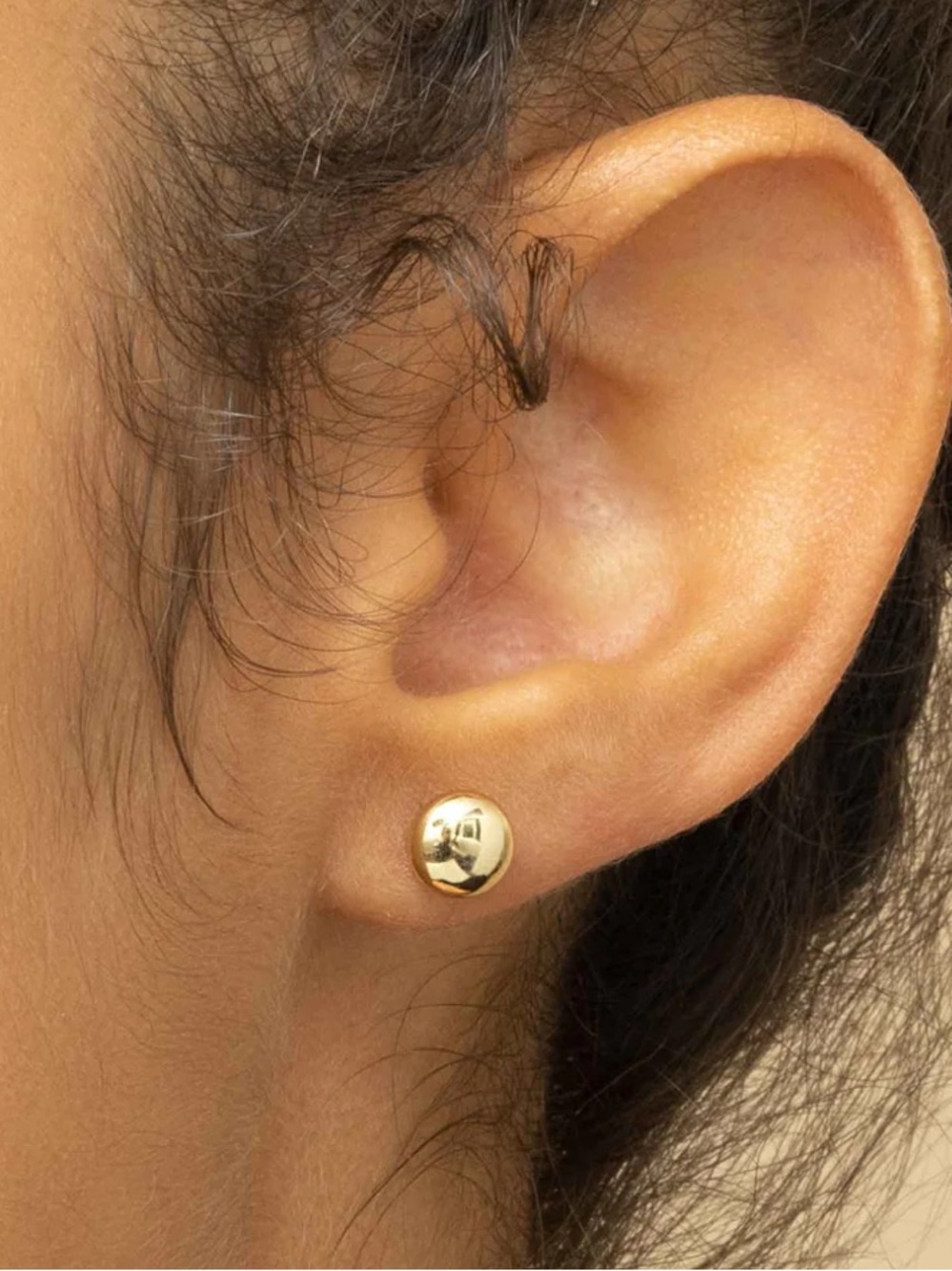 Oradina 14K Solíd Gold Earrings Buttoned Up studs.
Very few uses.